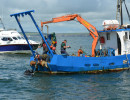 Diver directing lifting of AUD anchor.